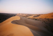 Lever de soleil sur les dunes de Wahiba © OT Oman